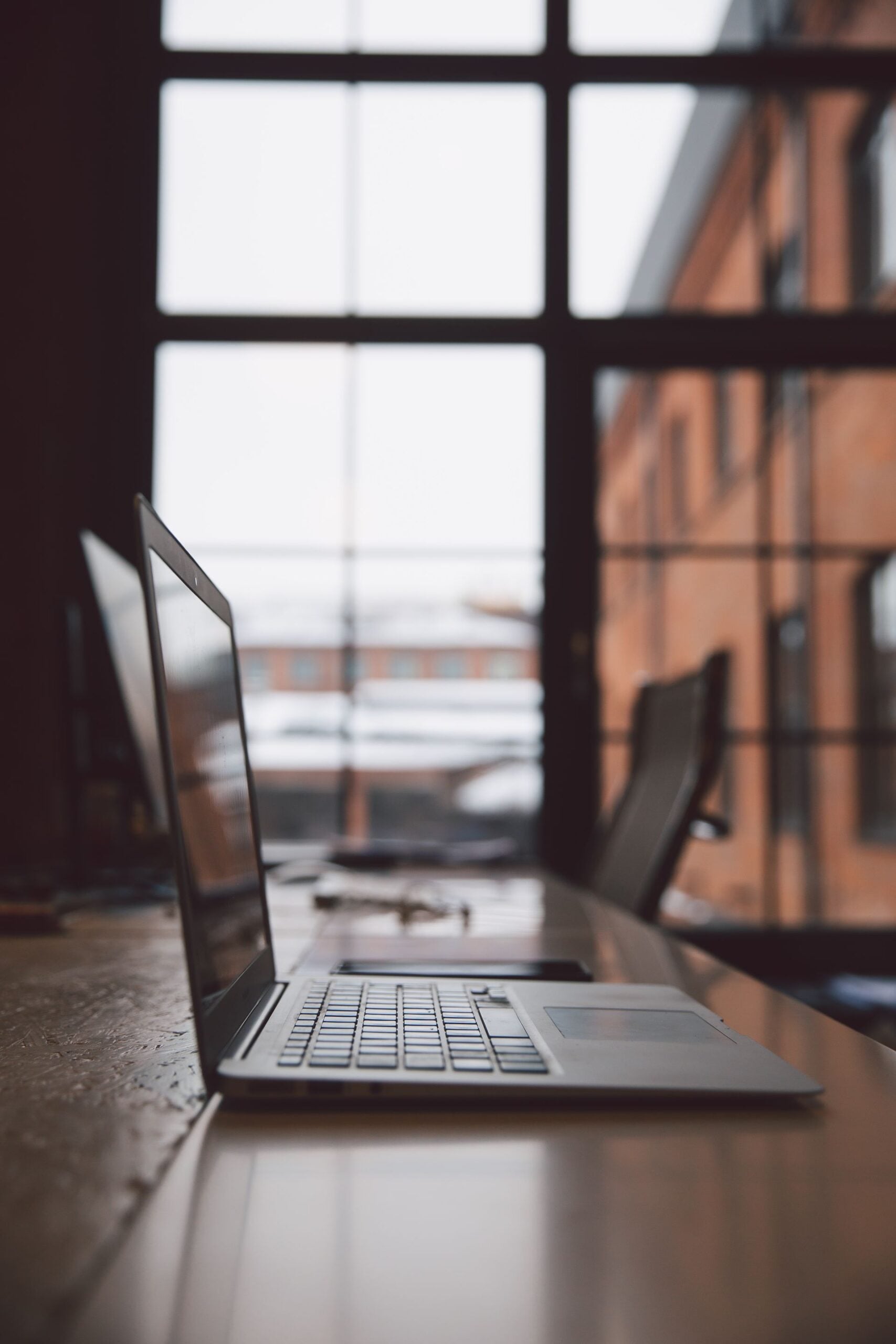 Workspace with desks and laptops